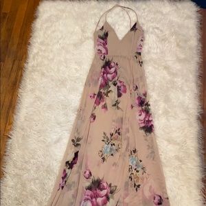 Long floral dress with open back and slit at leg